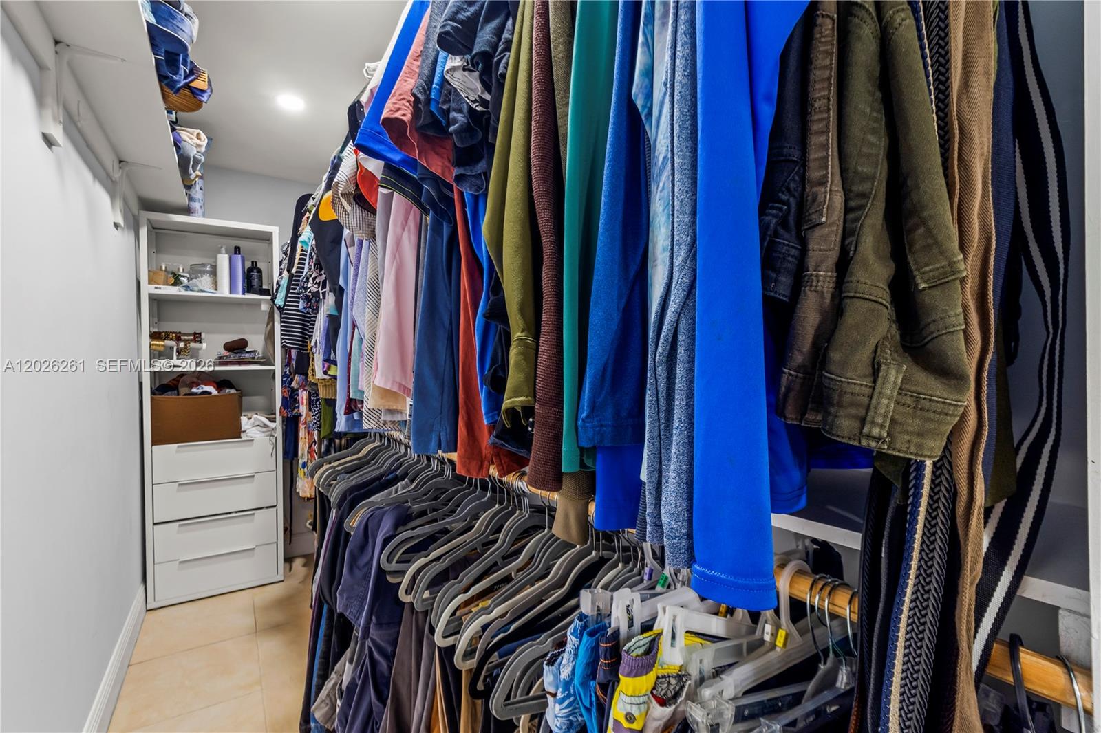 6250 Southwest 20th Terrace Miami, FL 33155 - Photo 27 of 42 a view of walk in closet with clothes