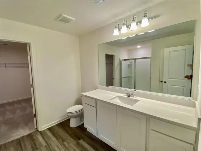 a view of a room with racks on the wall