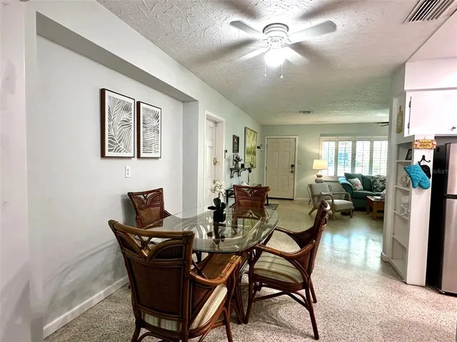 a view of a livingroom and dining room