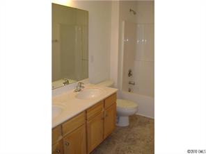 152 Lighthouse Road Mount Holly, NC 28120 - Photo 12 of 16 a bathroom with a sink and a toilet