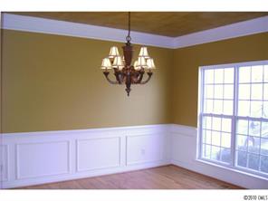 152 Lighthouse Road Mount Holly, NC 28120 - Photo 2 of 16 a view of a kitchen with wooden floor