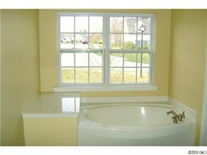 152 Lighthouse Road Mount Holly, NC 28120 - Photo 10 of 16 a bathroom with a bathtub