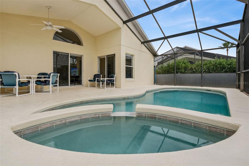 1202 Winding Cypress Court Kissimmee, FL 34746 - Photo 30 of 41 a view of swimming pool with outdoor seating