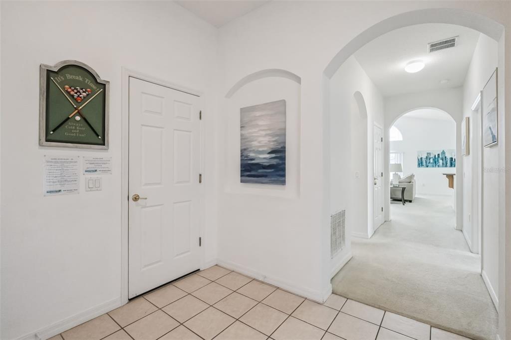 1202 Winding Cypress Court Kissimmee, FL 34746 - Photo 4 of 41 a view of a hallway with closet