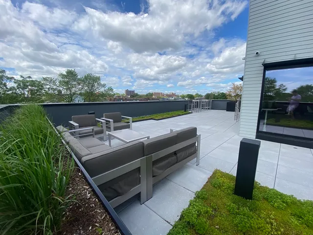 a view of a garden with patio