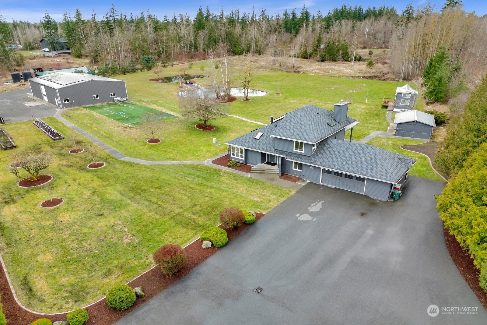 5874 Milwaukee Road Bellingham, WA 98226 - Photo 1 of 33 a view of a swimming pool with a yard