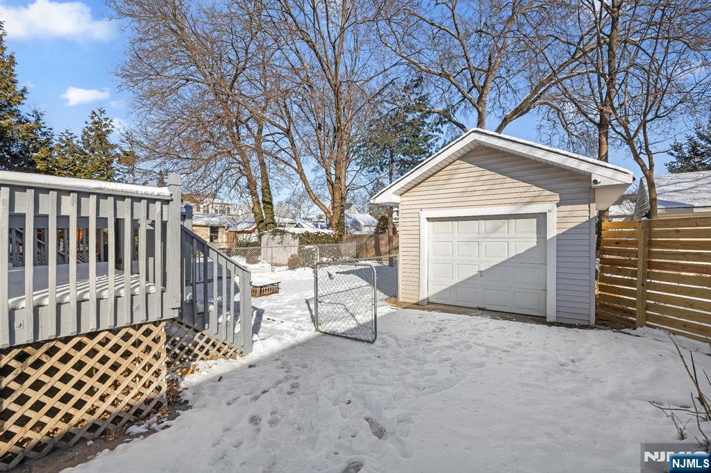 159 2nd Avenue Hawthorne, NJ 07506 - Photo 24 of 26 a front view of a house with a garage
