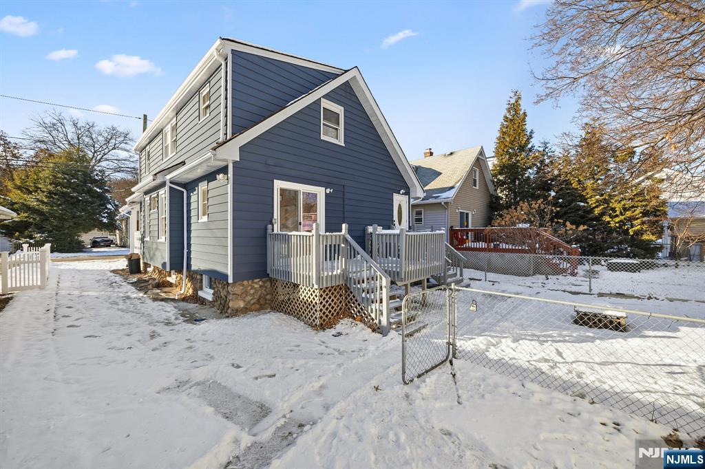 159 2nd Avenue Hawthorne, NJ 07506 - Photo 26 of 26 a view of a house with backyard and a tree