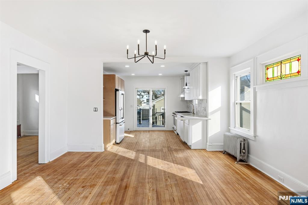 159 2nd Avenue Hawthorne, NJ 07506 - Photo 7 of 26 a view of a kitchen and an entryway