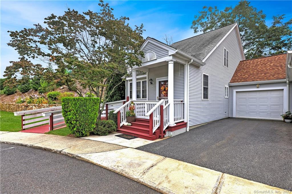 a front view of a house with a garage