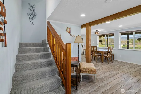 a view of dining room with furniture and chandelier