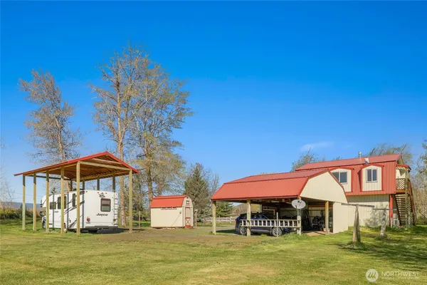 a aerial view of a house with a yard