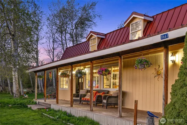 a view of house with garden space and street view