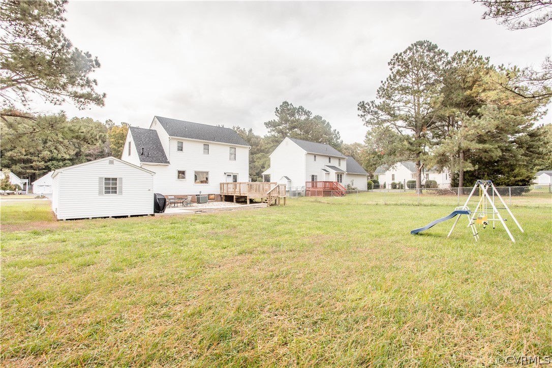 7487 Trailing Rock Road Prince George, VA 23875 - Photo 5 of 33 a view of a swimming pool with an outdoor space