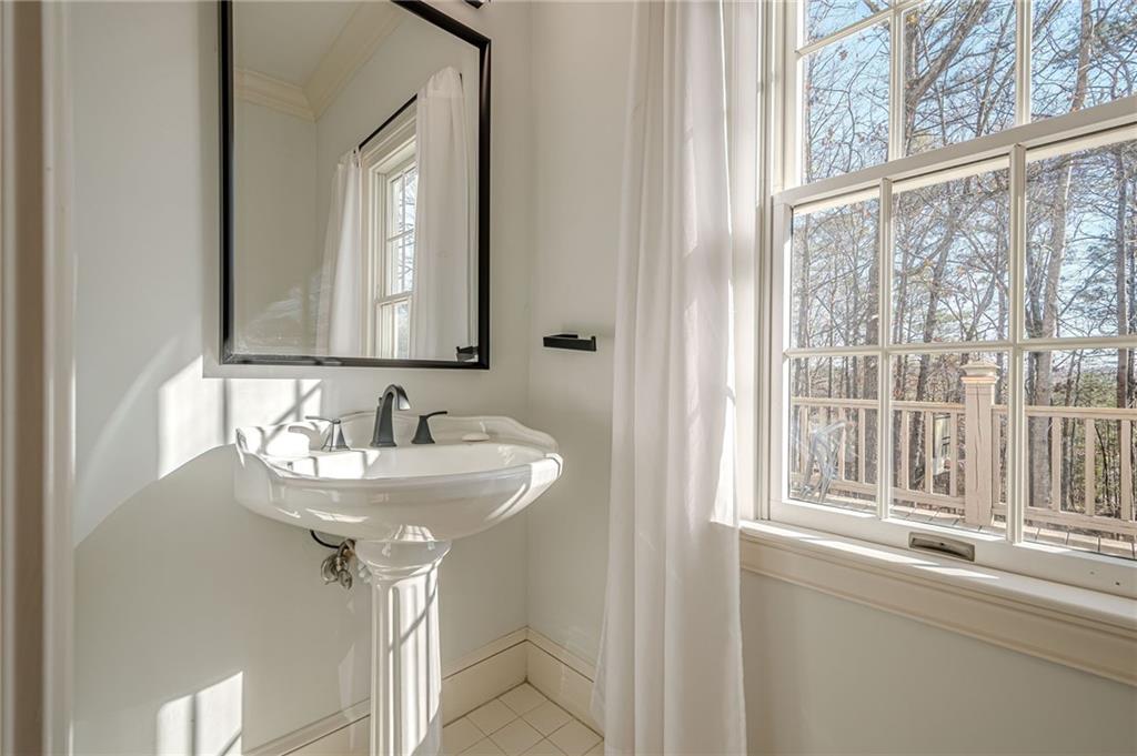 34 Johnston Row Northwest Cartersville, GA 30121 - Photo 51 of 95 a bathroom with a sink and a window