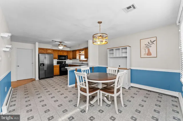 a view of a dining room with furniture
