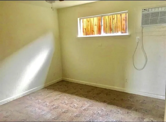 a view of a room with a window