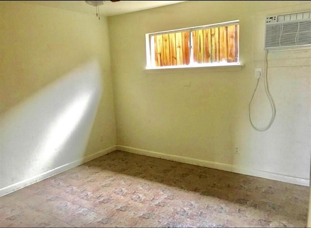 1755 Colquitt Street, Unit 7 Houston, TX 77098 - Photo 12 of 20 a view of a room with a window