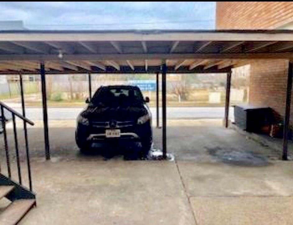 1755 Colquitt Street, Unit 7 Houston, TX 77098 - Photo 19 of 20 a car parked in a parking garage