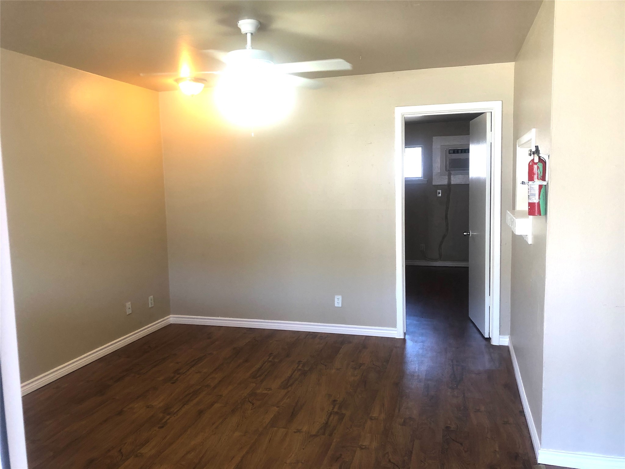 1755 Colquitt Street, Unit 7 Houston, TX 77098 - Photo 2 of 20 a view of a hallway with wooden floor