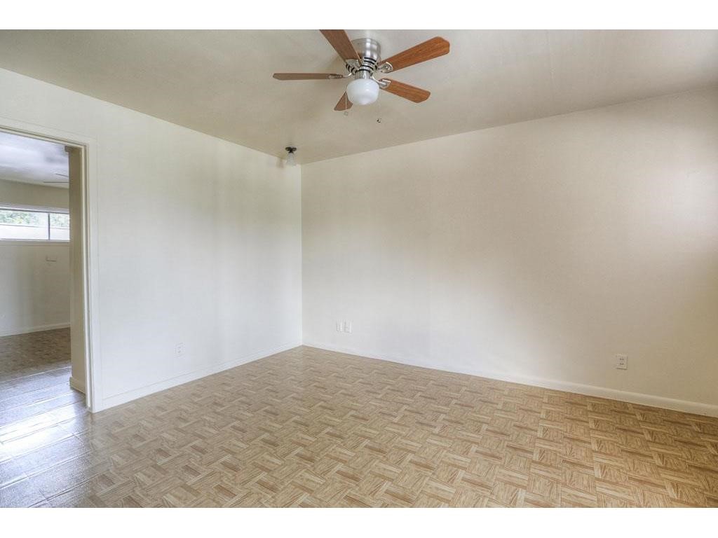 1755 Colquitt Street, Unit 7 Houston, TX 77098 - Photo 9 of 20 a view of an empty room and kitchen view