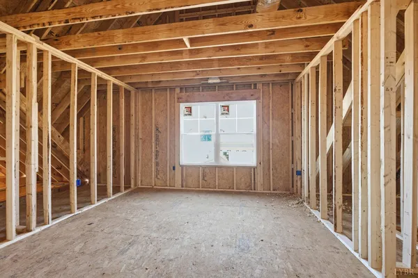 a view of an empty room with stairs