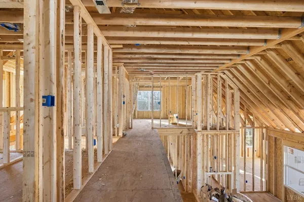 a view of a door with wooden floor and a door