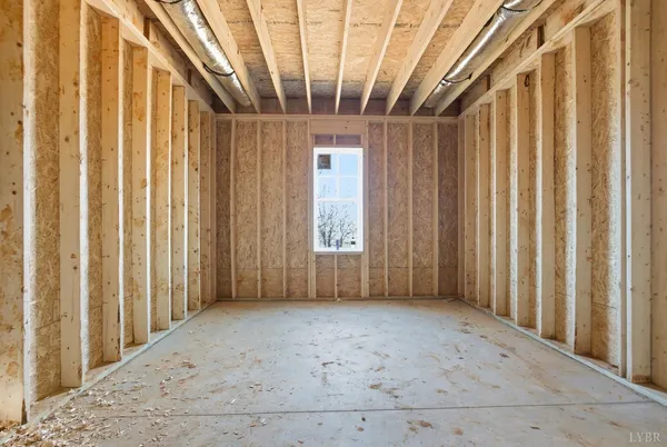 a view of entryway with wooden walls