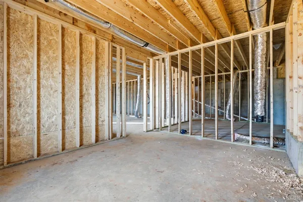 a view of a room with wooden walls