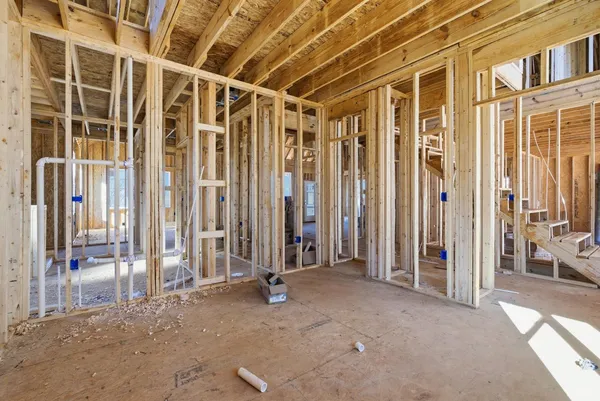 a view of a balcony with wooden fence