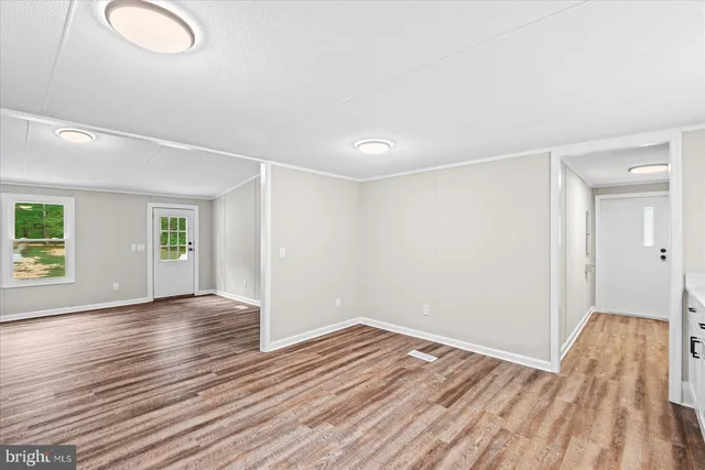 a view of small space with wooden floor