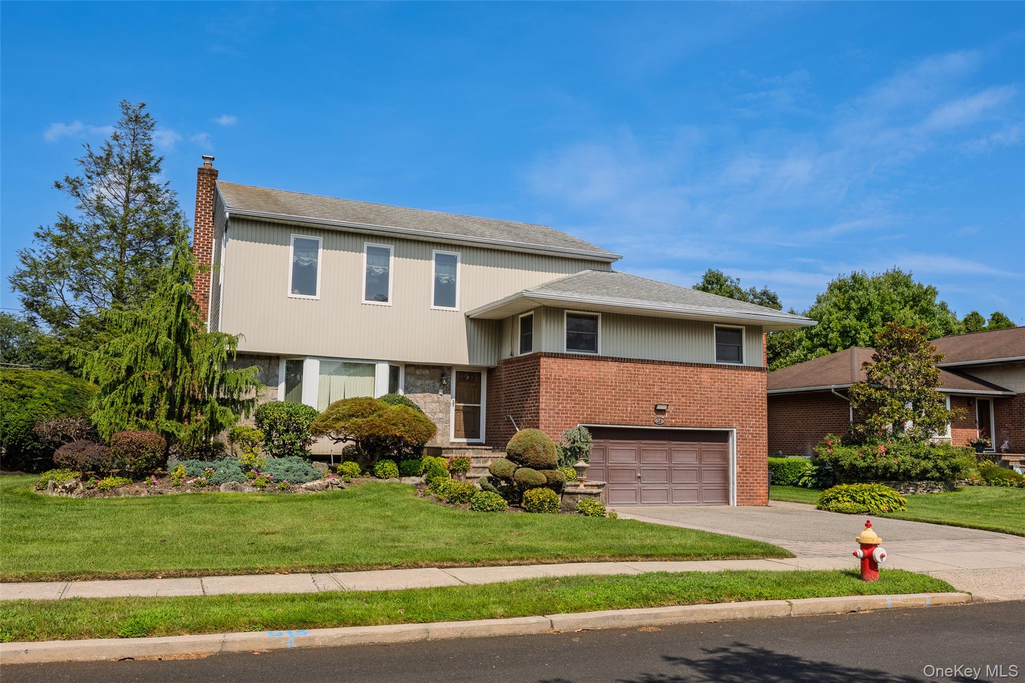 16 Winthrop Road Plainview, NY 11803 - Photo 32 of 33 Great Curb Appeal!