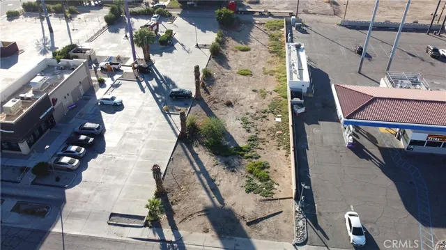 a view of balcony with wooden floor