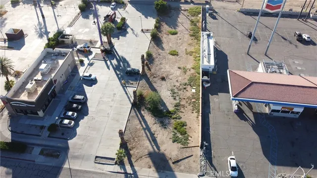 a view of balcony with wooden floor