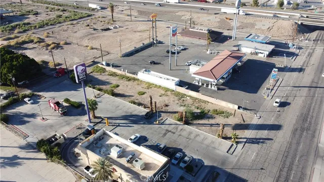 an aerial view of a building with outdoor space