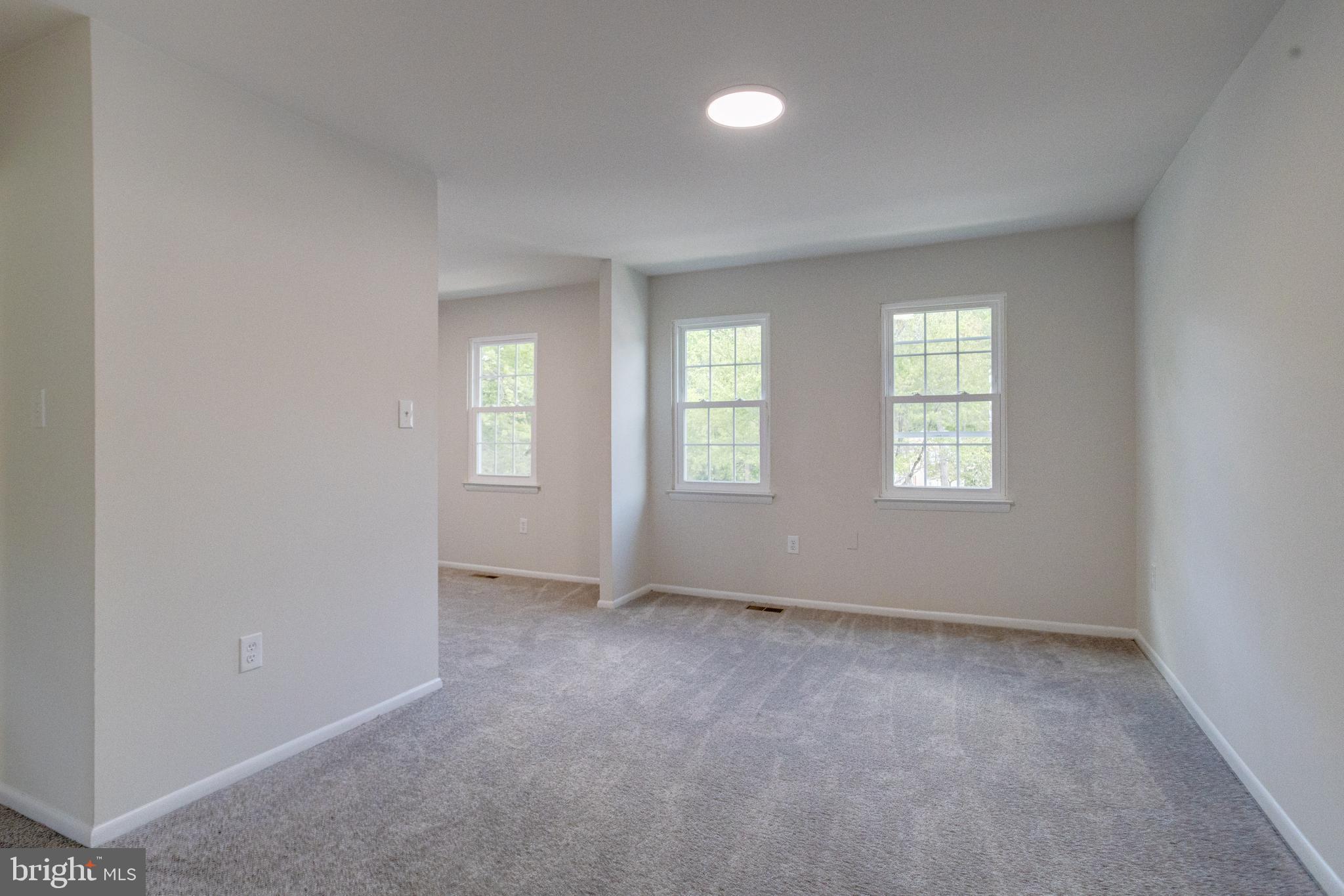 15925 Dorset Road, Unit 199 Laurel, MD 20707 - Photo 21 of 50 an empty room with windows