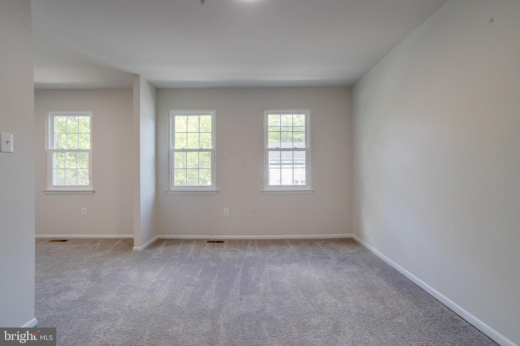 15925 Dorset Road, Unit 199 Laurel, MD 20707 - Photo 22 of 50 an empty room with windows