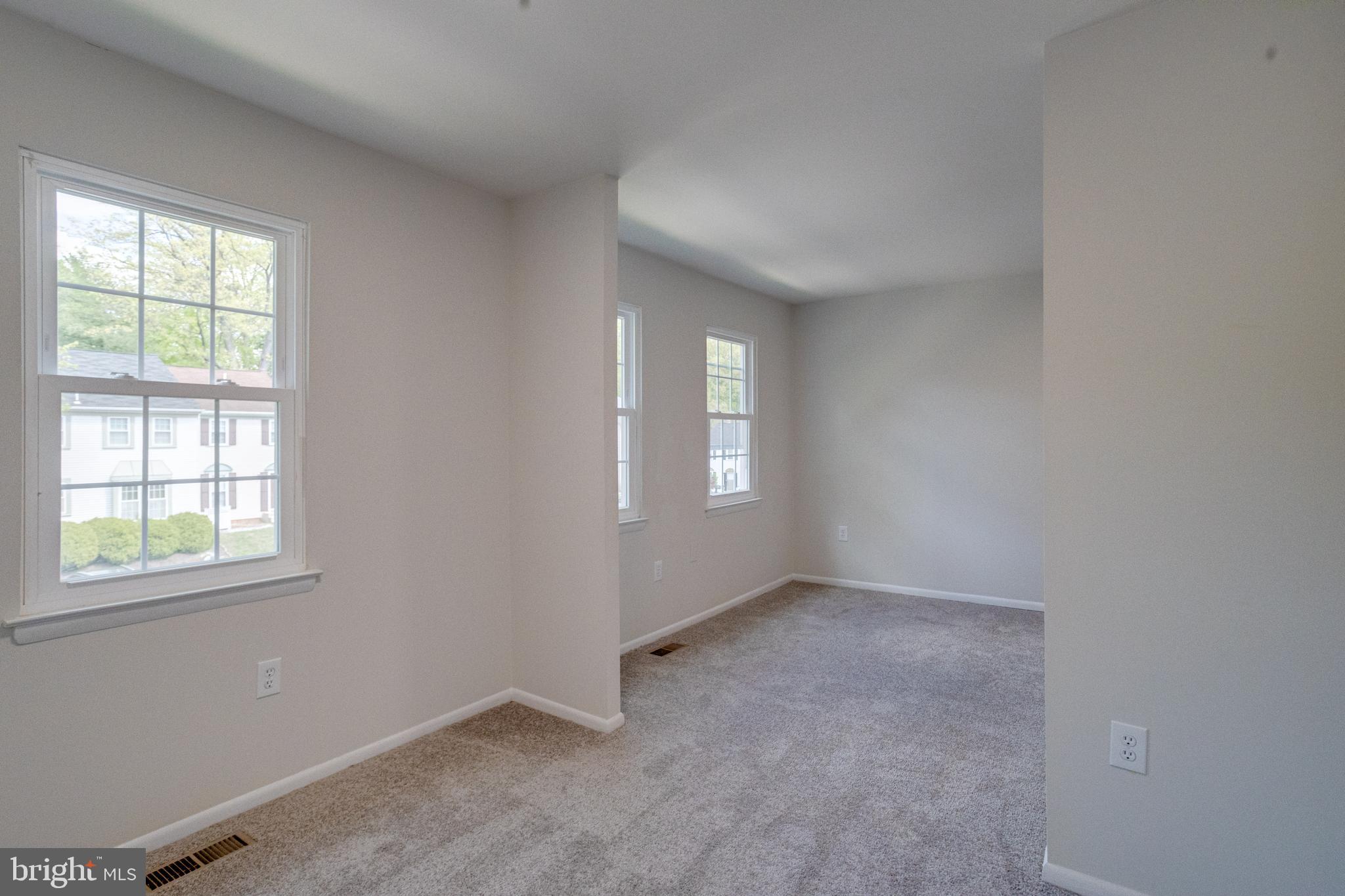 15925 Dorset Road, Unit 199 Laurel, MD 20707 - Photo 27 of 50 an empty room with windows