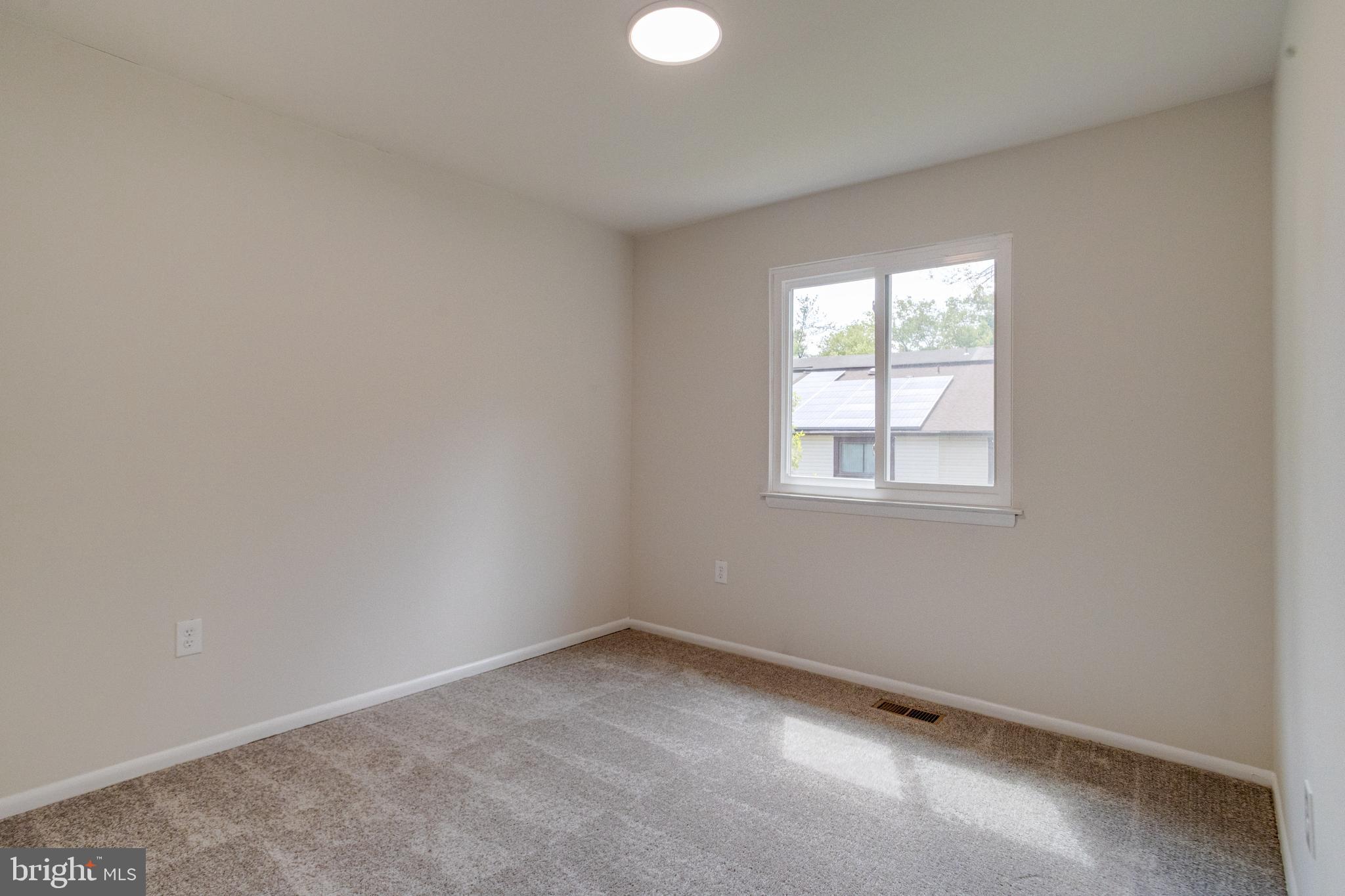 15925 Dorset Road, Unit 199 Laurel, MD 20707 - Photo 30 of 50 an empty room with a window