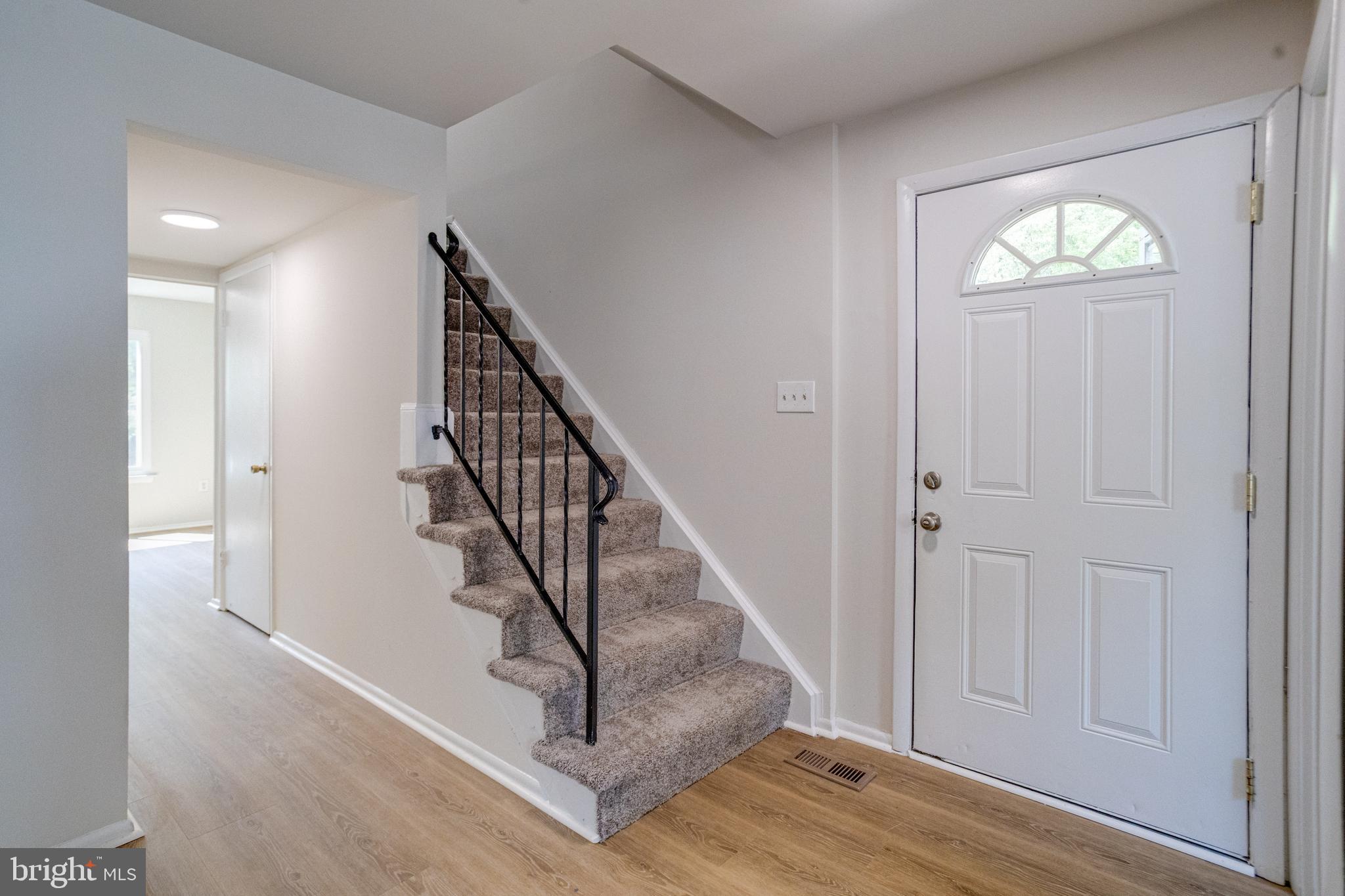 15925 Dorset Road, Unit 199 Laurel, MD 20707 - Photo 3 of 50 a view of entryway with wooden floor