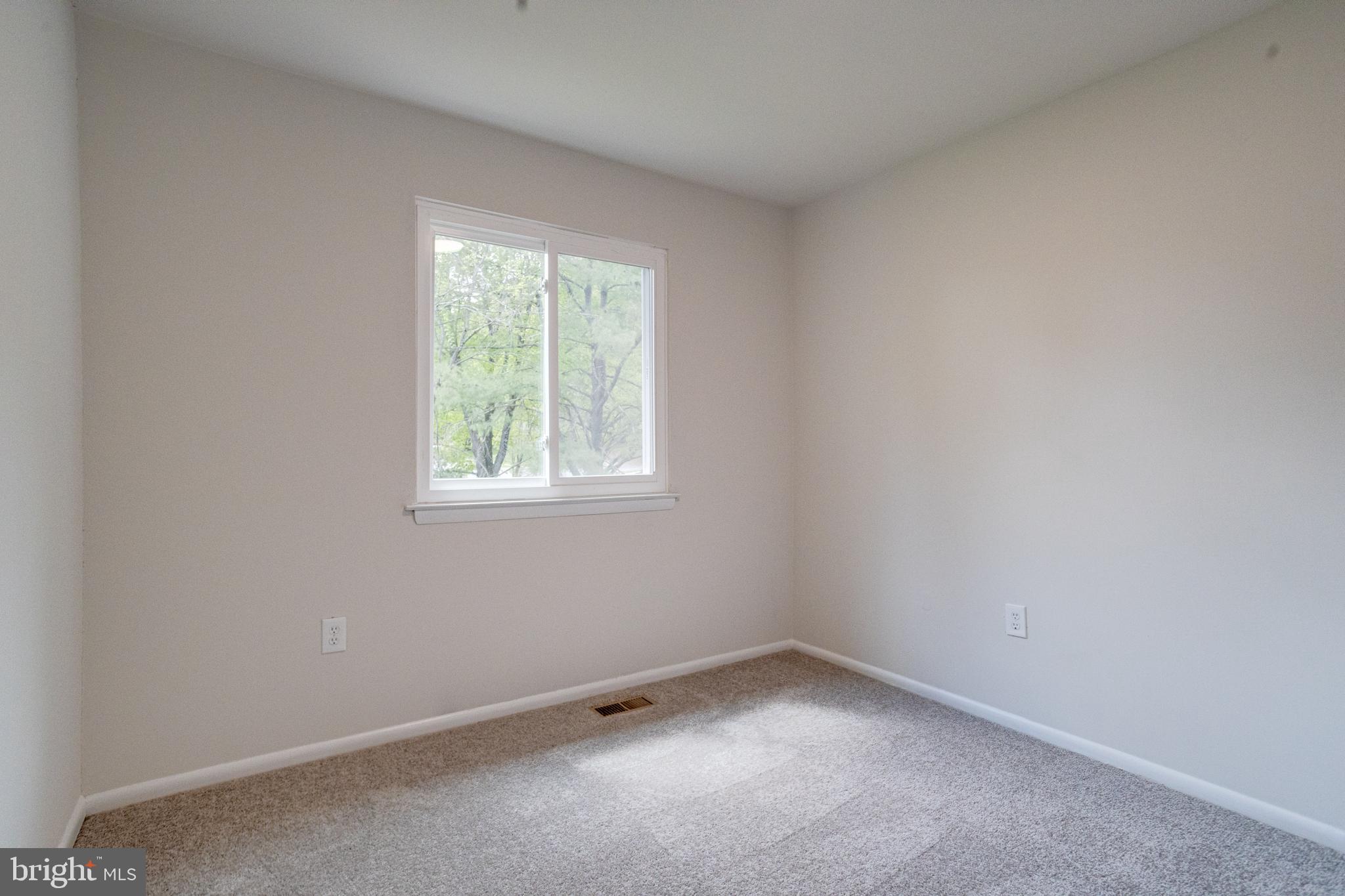 15925 Dorset Road, Unit 199 Laurel, MD 20707 - Photo 31 of 50 an empty room with a window