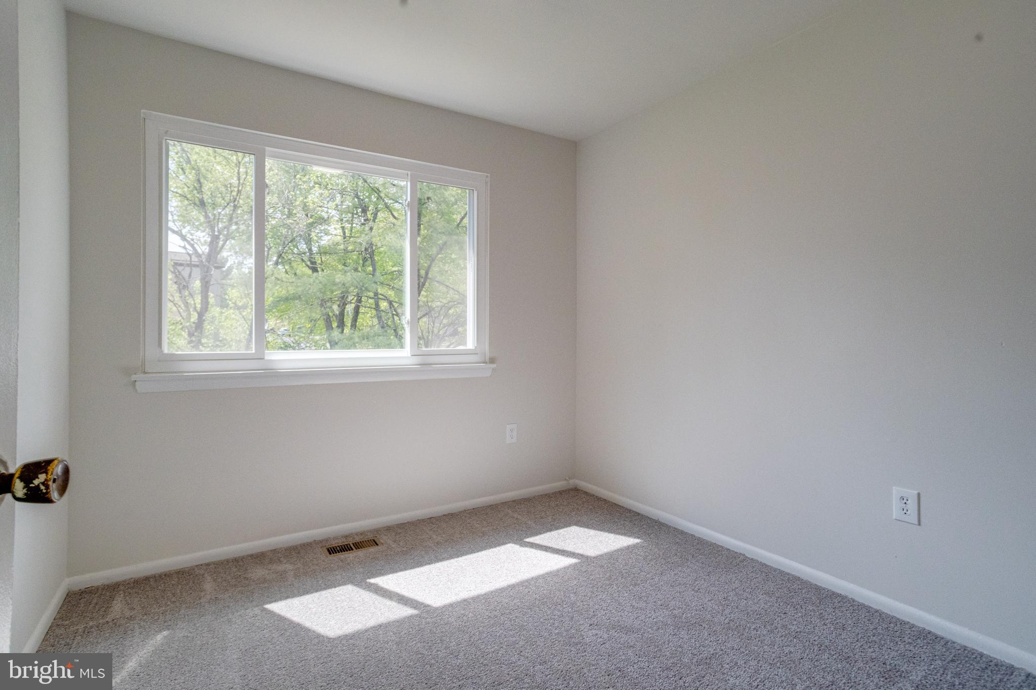 15925 Dorset Road, Unit 199 Laurel, MD 20707 - Photo 34 of 50 an empty room with a window