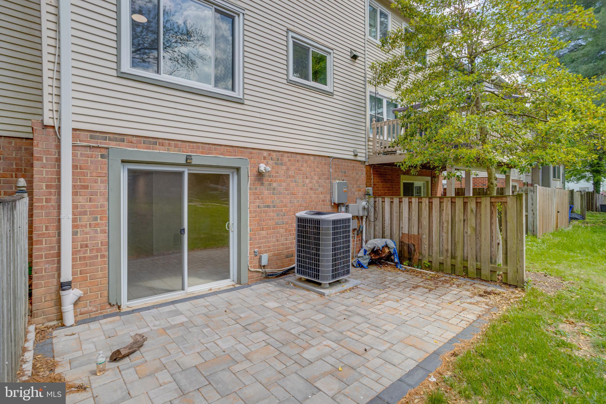 15925 Dorset Road, Unit 199 Laurel, MD 20707 - Photo 49 of 50 a backyard of a house with barbeque oven