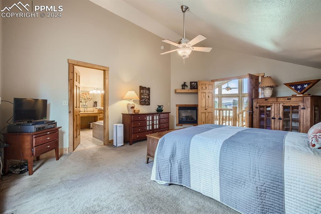 182 Joshua Road Divide, CO 80814 - Photo 22 of 41 a spacious bedroom with a bed and dresser