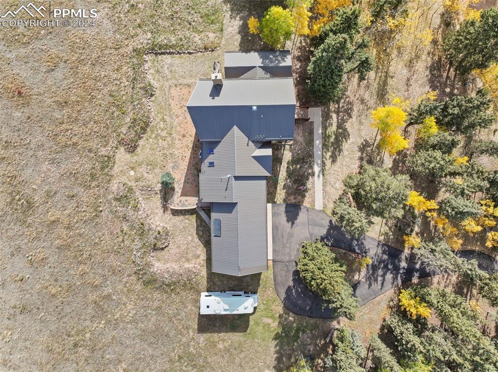 182 Joshua Road Divide, CO 80814 - Photo 41 of 41 view of building with yard