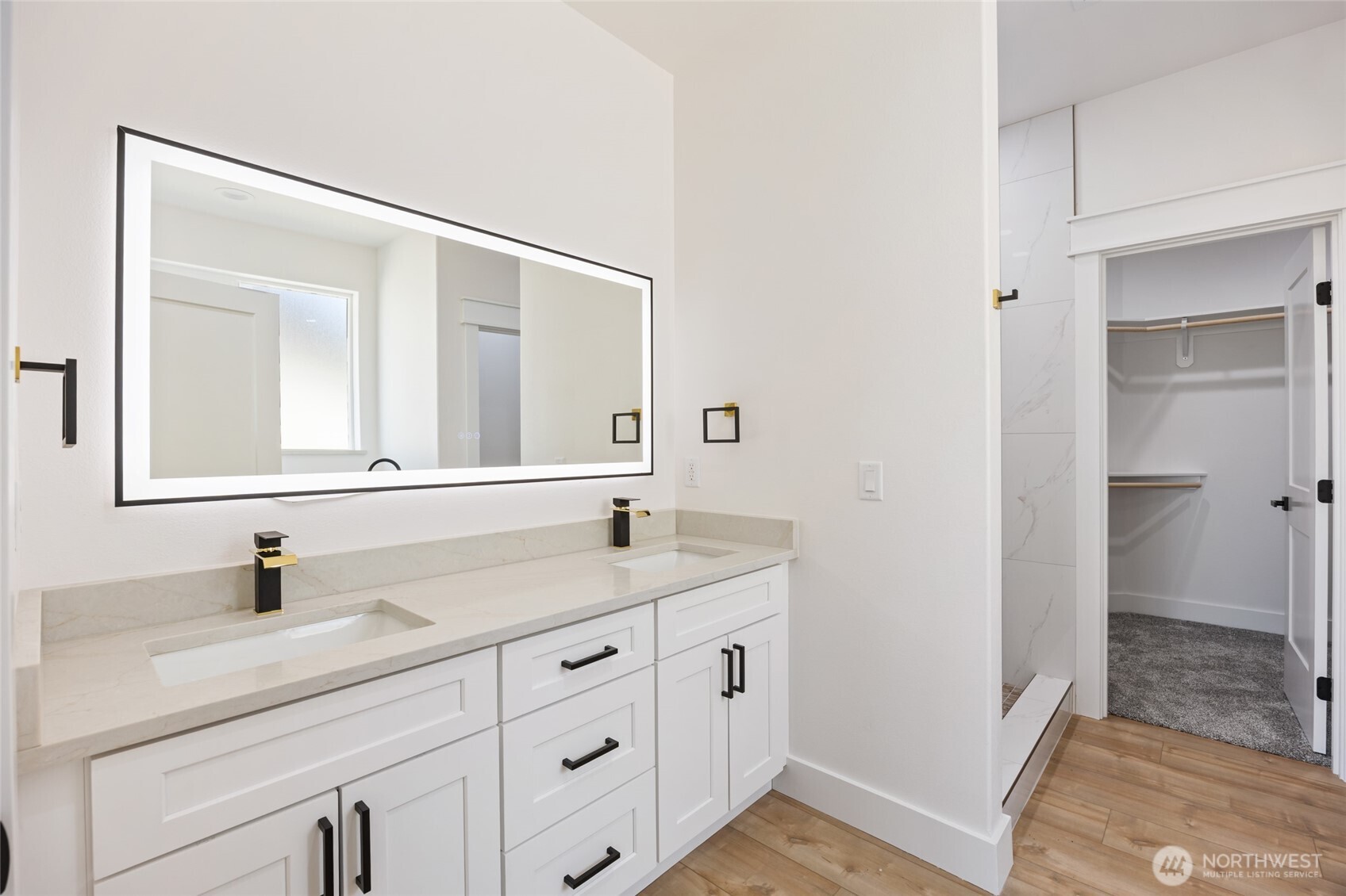 2394 Hunters Street Ephrata, WA 98823 - Photo 20 of 40 a bathroom with a sink and a mirror