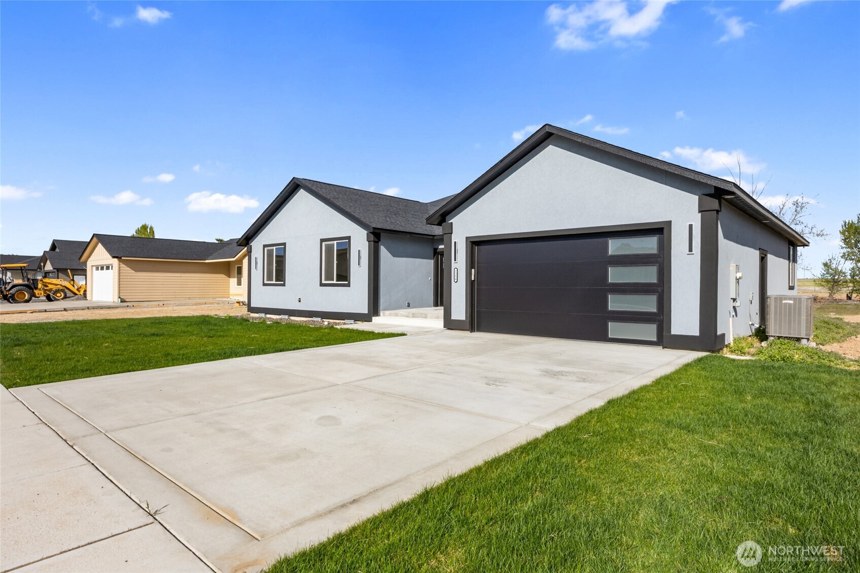 2394 Hunters Street Ephrata, WA 98823 - Photo 2 of 40 a view of an house with backyard and garden