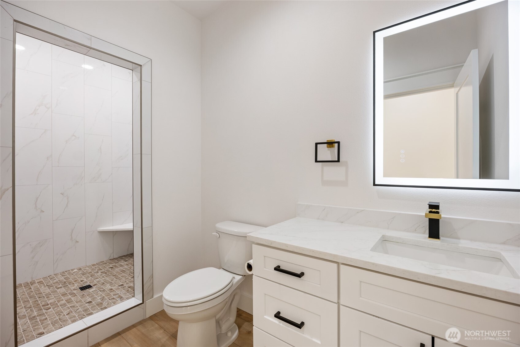 2394 Hunters Street Ephrata, WA 98823 - Photo 26 of 40 a bathroom with a sink a toilet and a mirror
