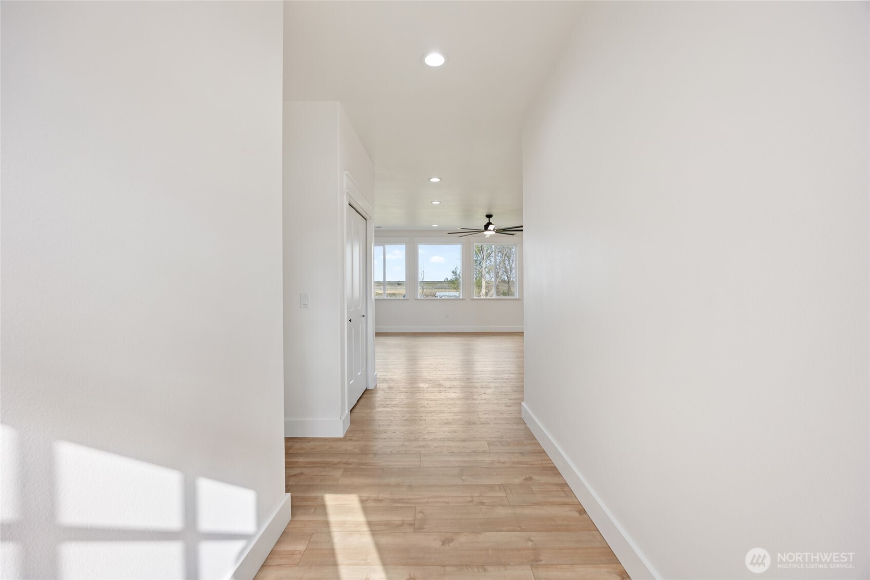2394 Hunters Street Ephrata, WA 98823 - Photo 4 of 40 a view of a hallway with wooden floor