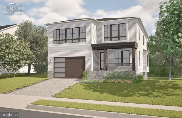 a view of a hallway with wooden floor and entryway